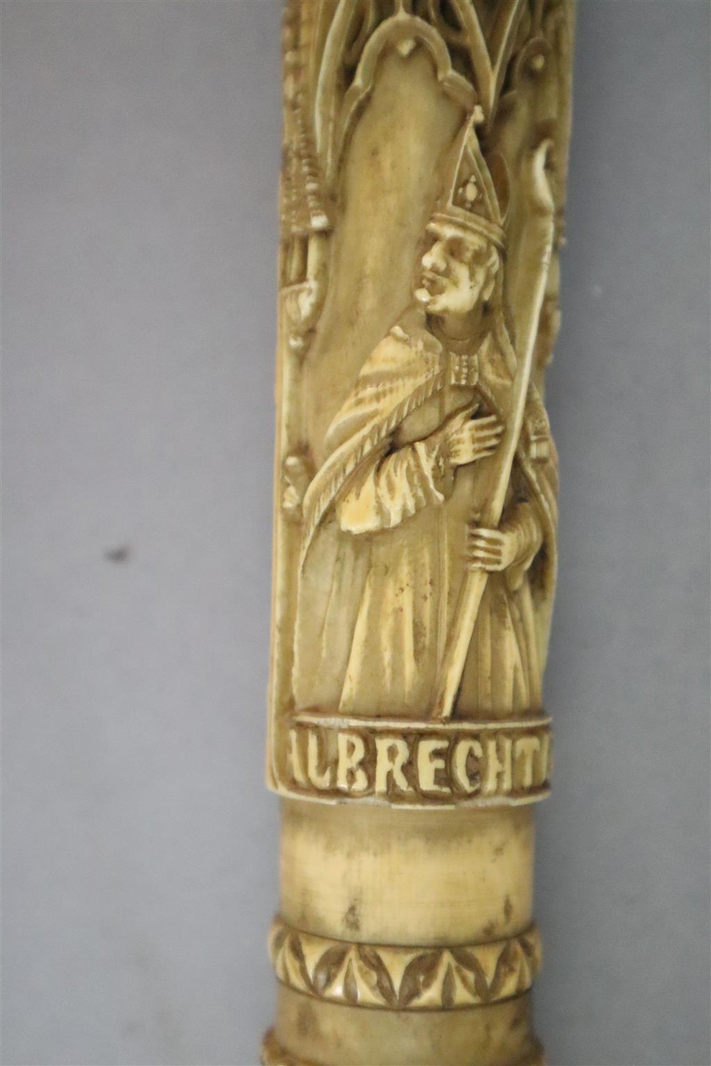 A 19th century Dieppe carved ivory crozier, thought to be a copy of a 13th century example, length 46in.